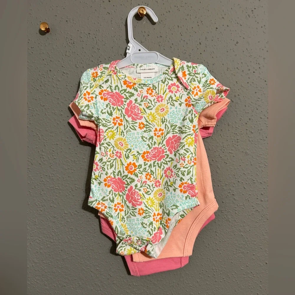 Laura Ashley Floral and Pink Bodysuit Set. (Set of 3 shirts)